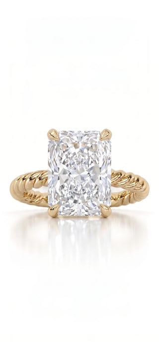 Radiant cut diamond ring in yellow gold