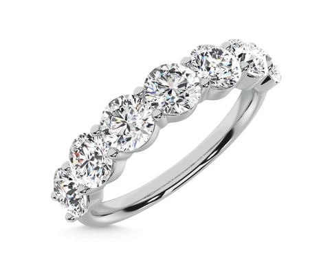 White gold ring with five round brilliant cut diamonds in an ascending pattern