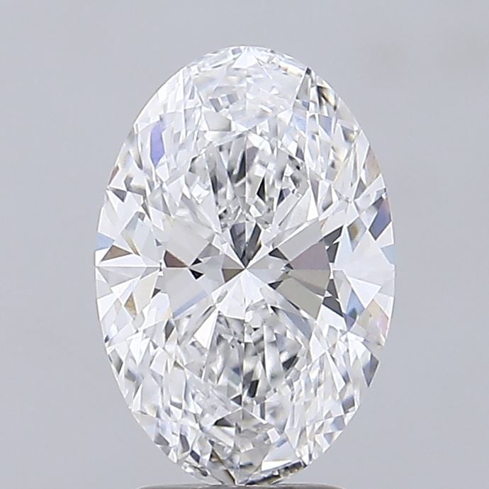 Brilliant-cut oval diamond with multiple facets displaying light refraction and sparkle against a light gray background