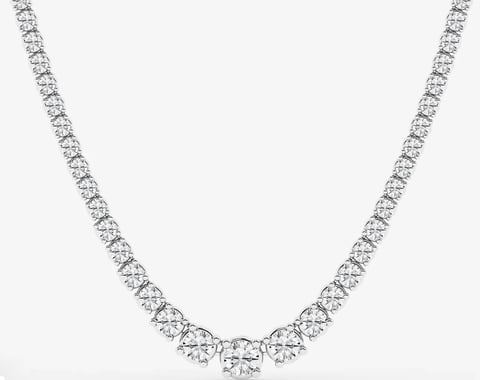 Diamond tennis necklace featuring a continuous line of round brilliant diamonds set in white metal.