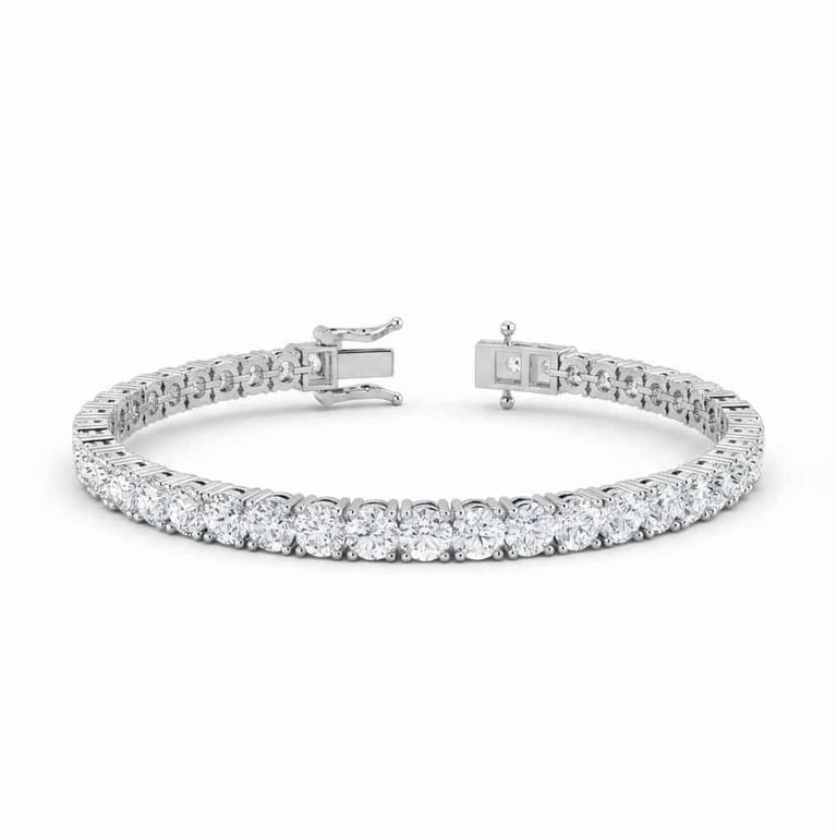 Silver tennis bracelet with round white diamonds set in a single row, displayed on white background