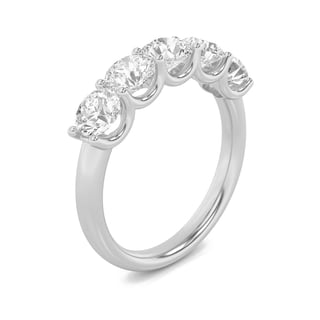 Five-stone diamond engagement ring in white metal on white background
