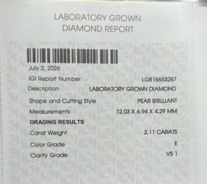 Laboratory Grown Diamond Report showing a 2.11 carat pear brilliant diamond with color grade E and clarity grade VS1