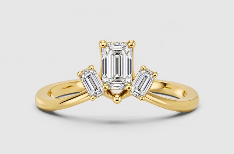 Gold engagement ring with emerald-cut diamond center stone and baguette-cut side diamonds