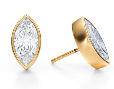 Pair of gold stud earrings with marquise-cut diamond stones shown from front and side angles