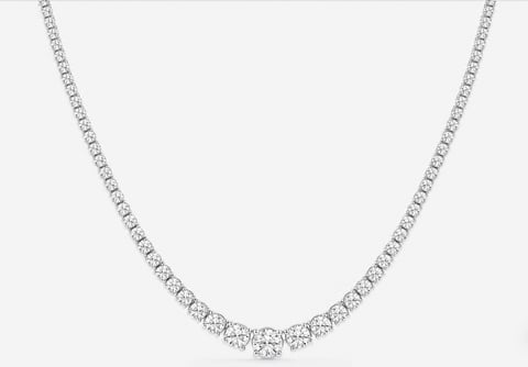 Silver diamond tennis necklace displayed on white background