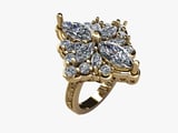 Gold cluster cocktail ring with marquise-cut and round lab-grown diamonds arranged in a floral bow design