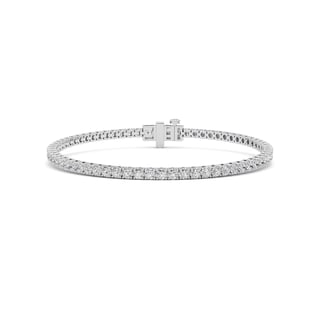 Silver diamond tennis bracelet with square clasp on white background