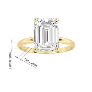 Gold engagement ring with emerald-cut diamond showing 1.8mm band width and 1mm approximate measurement details