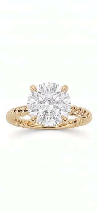 Round cut diamond ring in yellow gold